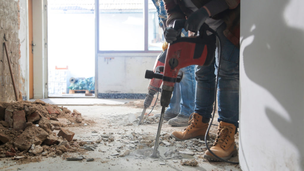 Insurance for Home Remodelers - drilling into floor